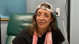 Screenshot of a female patient from a video review