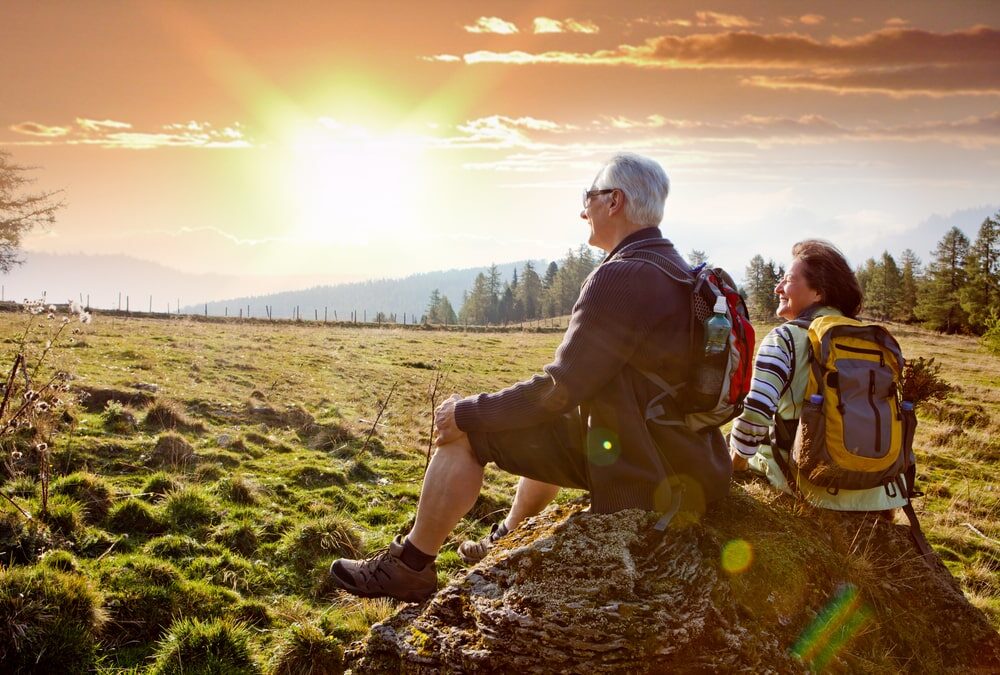 seniors hiking in nature on an autumn day