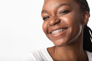 Portrait Of Black Girl In Dental Braces