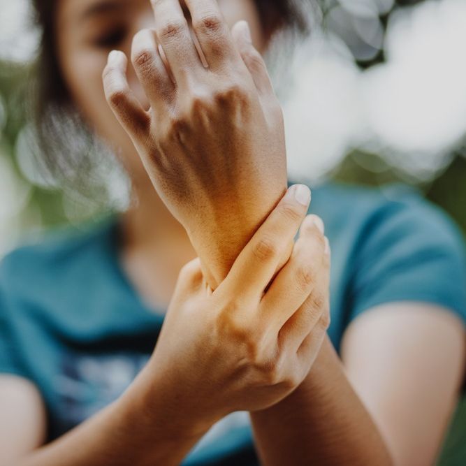 Close up young woman Left wrist pain