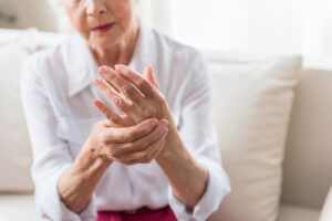 Elderly female is expressing pain