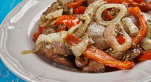 Liver And Kidney Sauce, Liver and Kidney cooked in a light Caramelised Onions sauce.