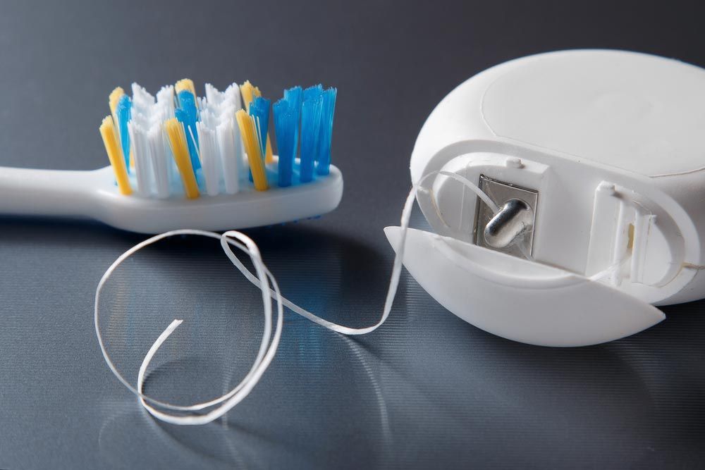Tooth brush and flosser