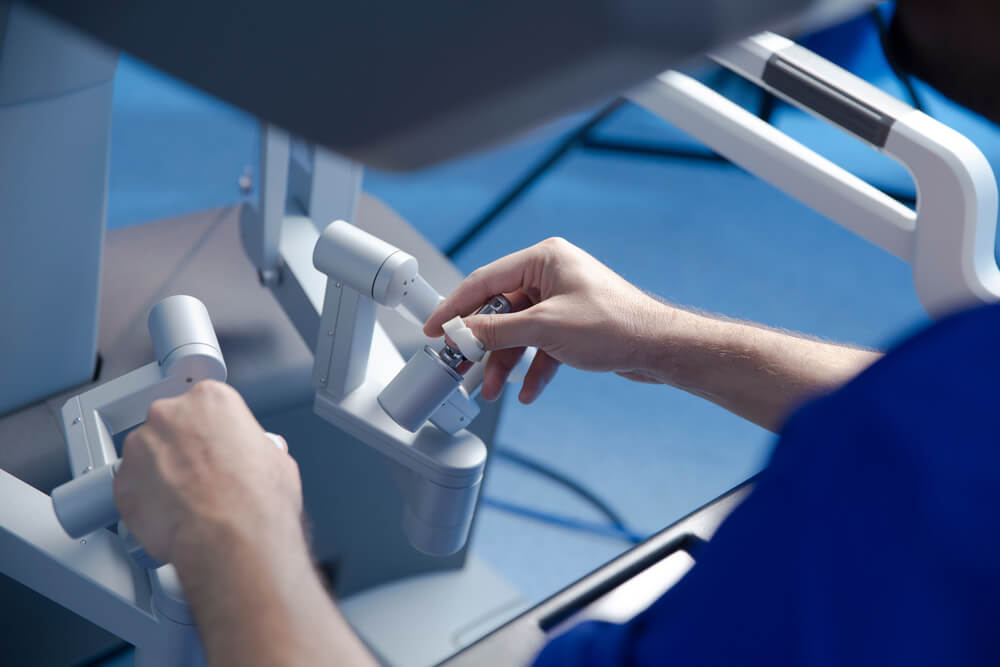 preparation for performing robotic surgery, doctor's hands