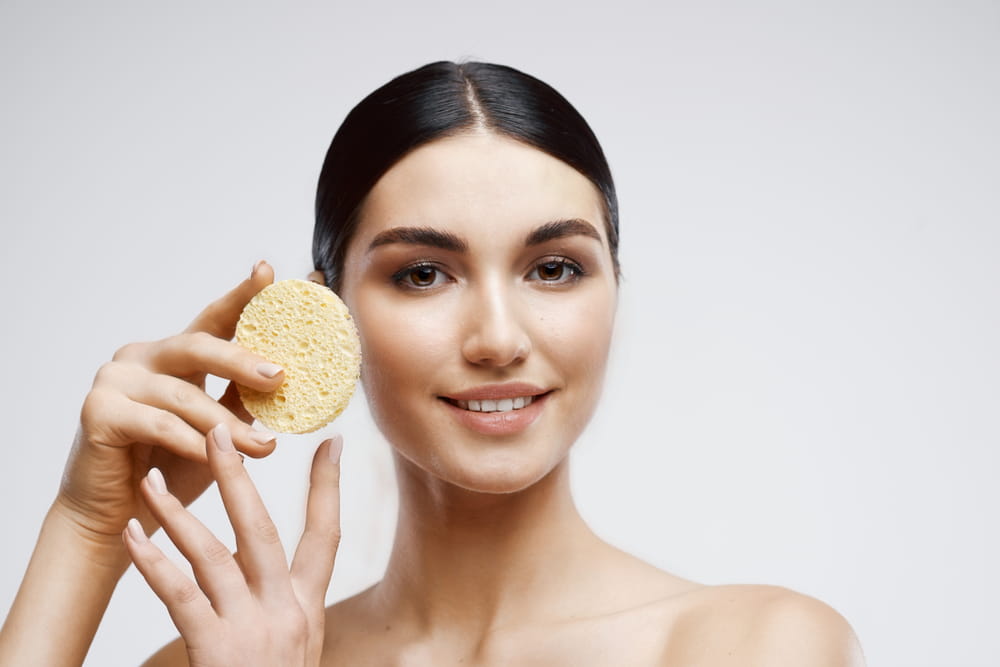 Beautiful elegant woman with bare shoulders clean skin spa treatments cosmetics dermatology