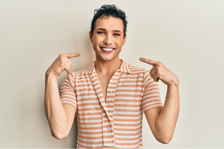 Handsome man wearing make up wearing casual t shirt