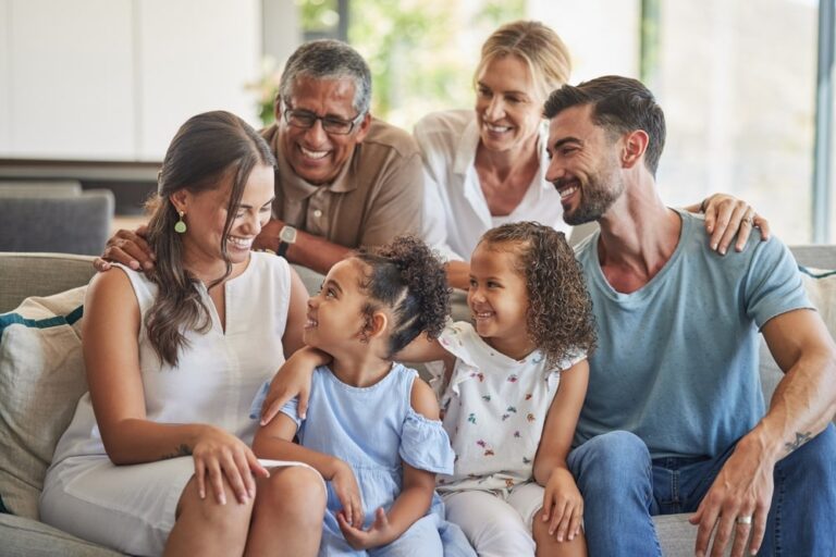 Big family, children and bonding seniors on living room sofa in house