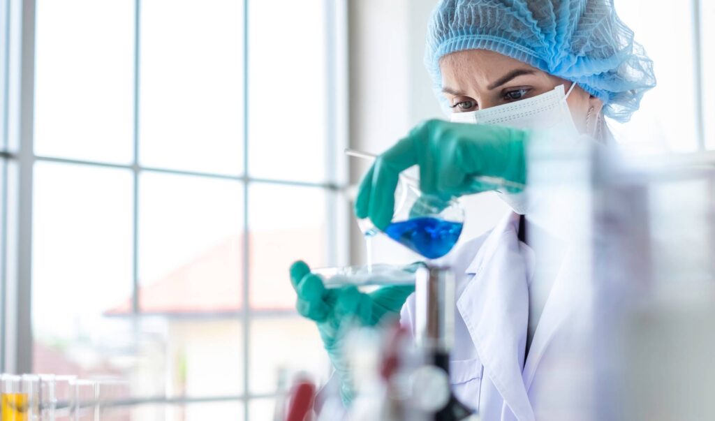 Female scientist testing experiment in a science lab