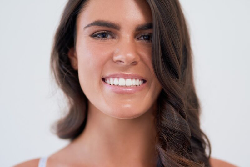 Female person, mouth hygiene and dental health for fresh breath, cosmetic results and treatment