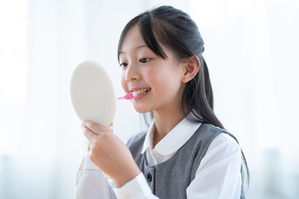Japanese woman with a toothbrush