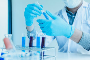 Close up. Medical or science medical in laboratory room research performs tests with liquid, Experimental Drug Treatment