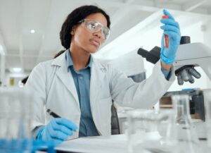woman and test tube with report in lab for dna analysis, medical research or pharmaceutical trial