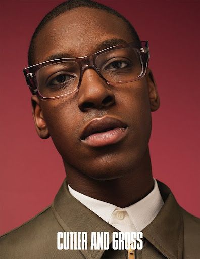 Young African American man with stylish eyeglasses