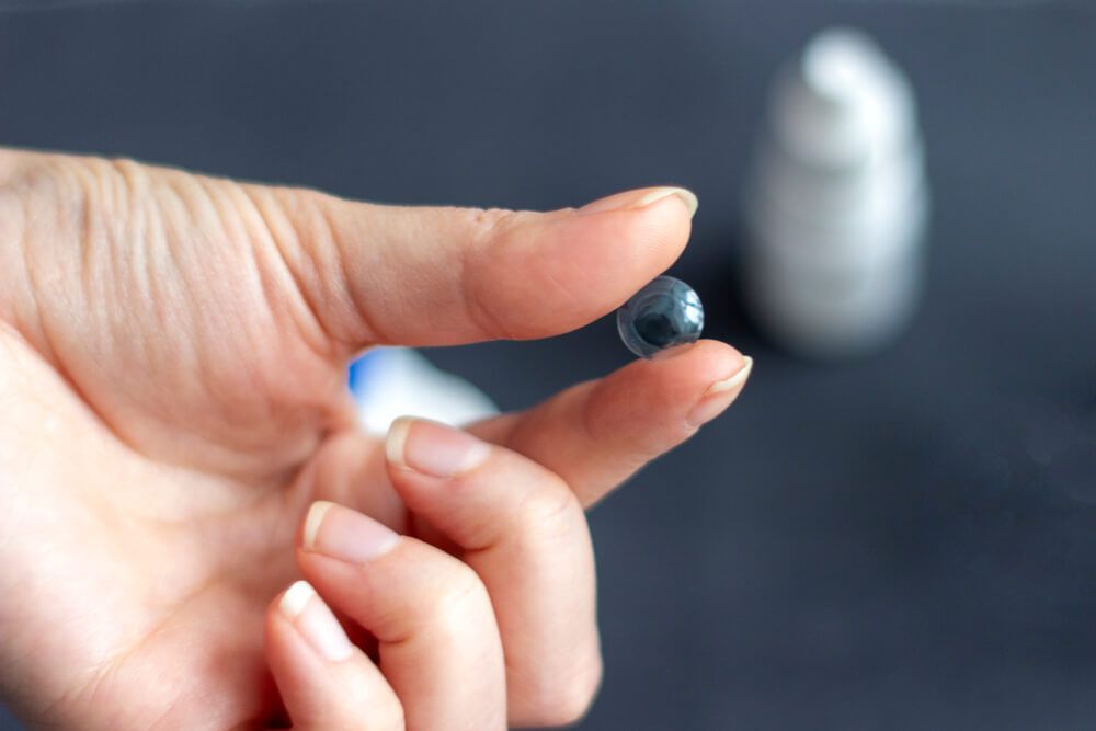 Contact eye lens on the finger.