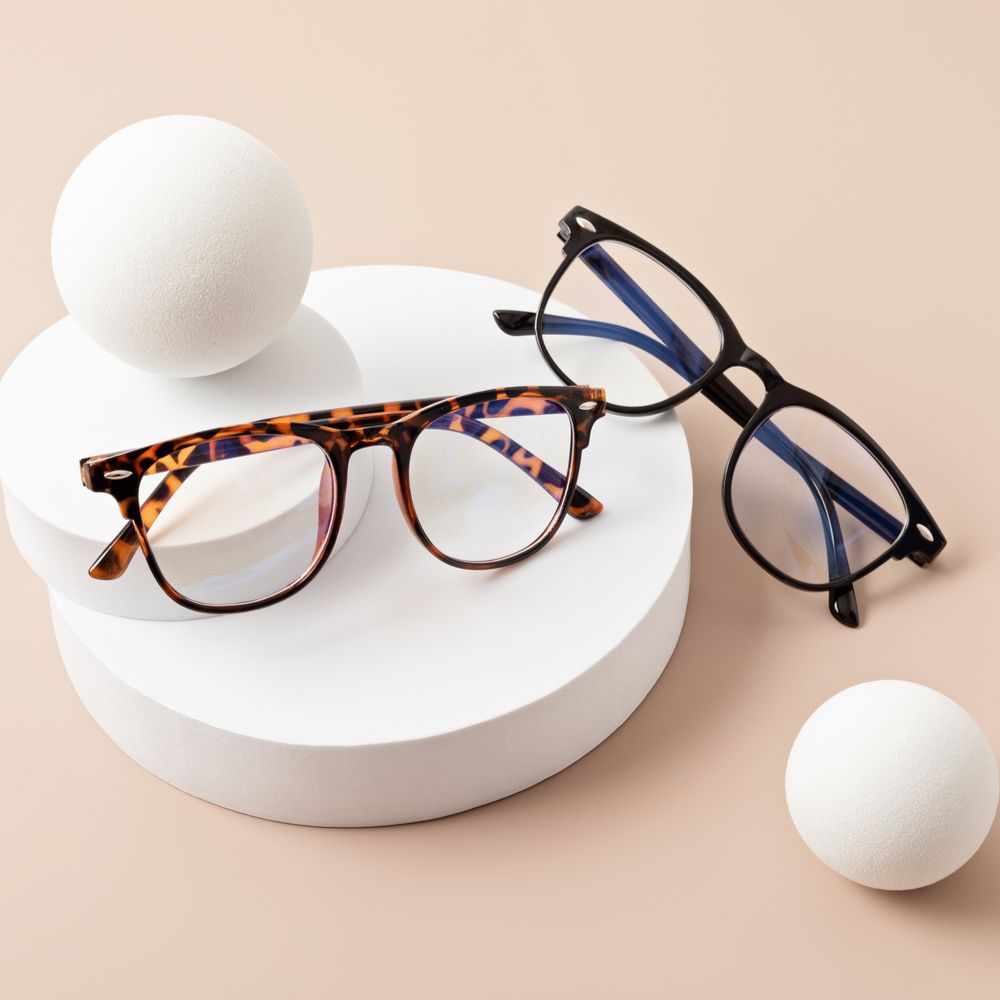Stylish eyeglasses over pastel background