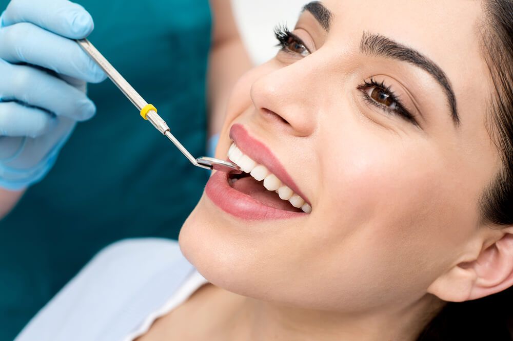 Close up woman getting a dental treatment