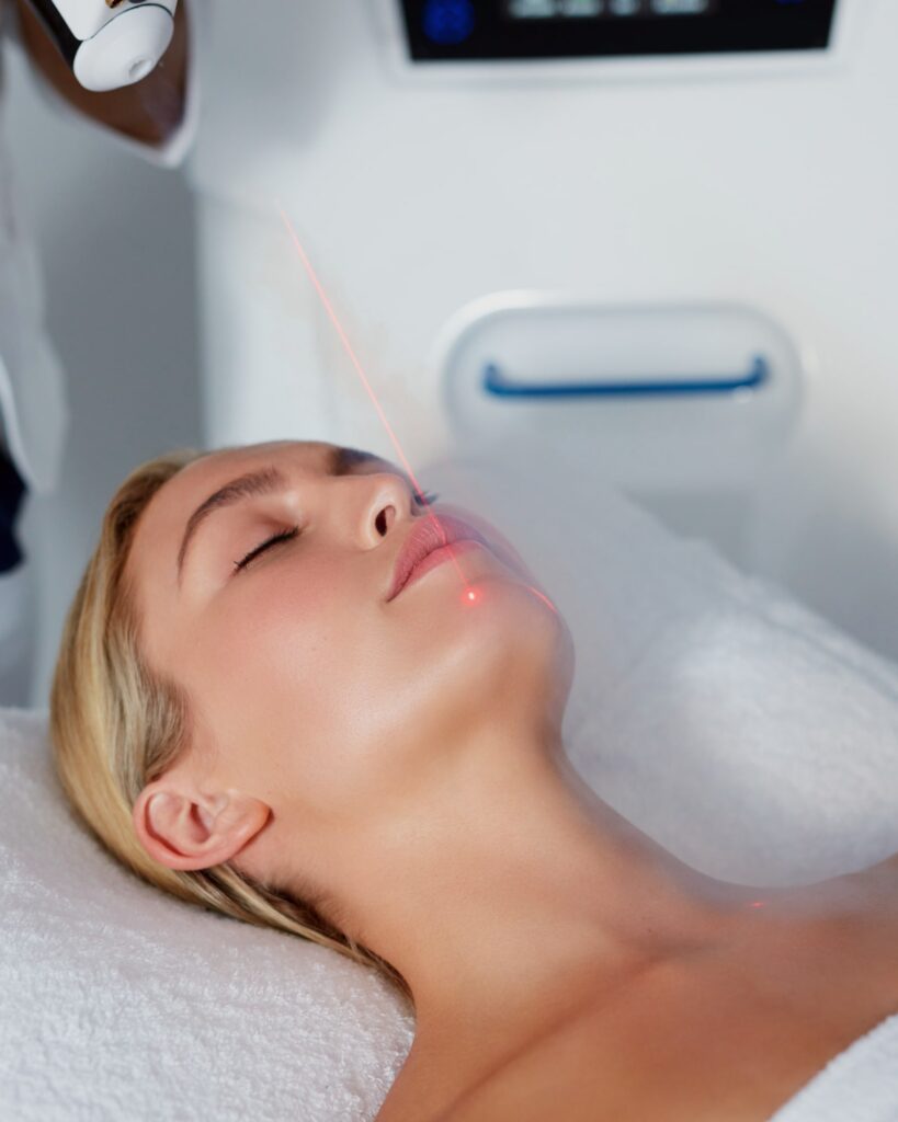 Young woman getting local cryotherapy therapy