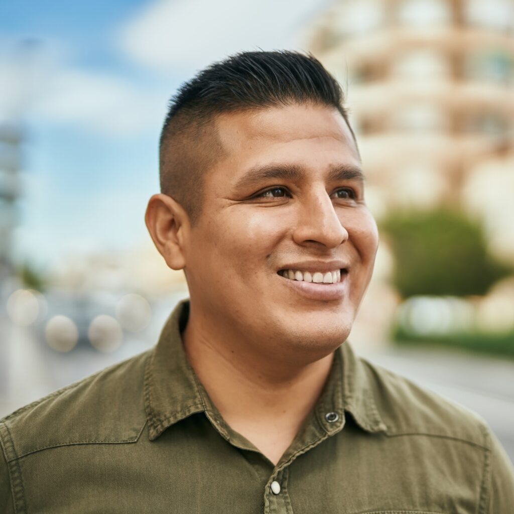 Young man smiling happy standing