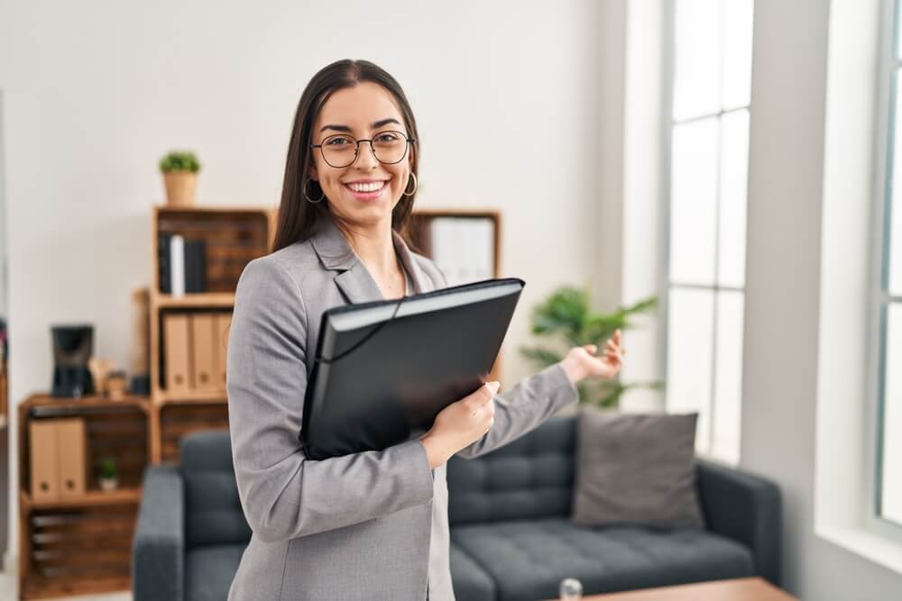 Young beautiful woman psychologist smiling confident