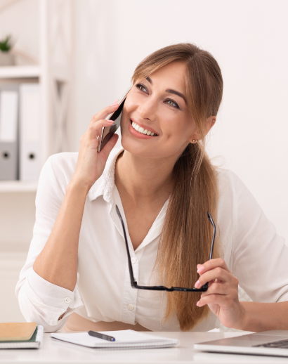 happy office girl talking on mobile phone sitting