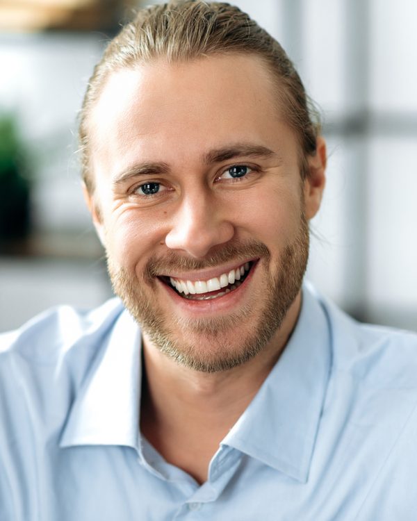 Close up portrait of charismatic handsome confident caucasian guy