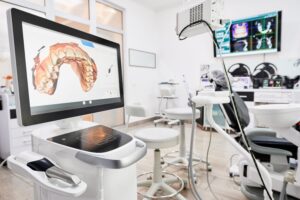 Interior of dental office with modern equipment and dental intraoral scanner