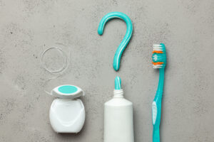 Toothpaste in the form of a question mark