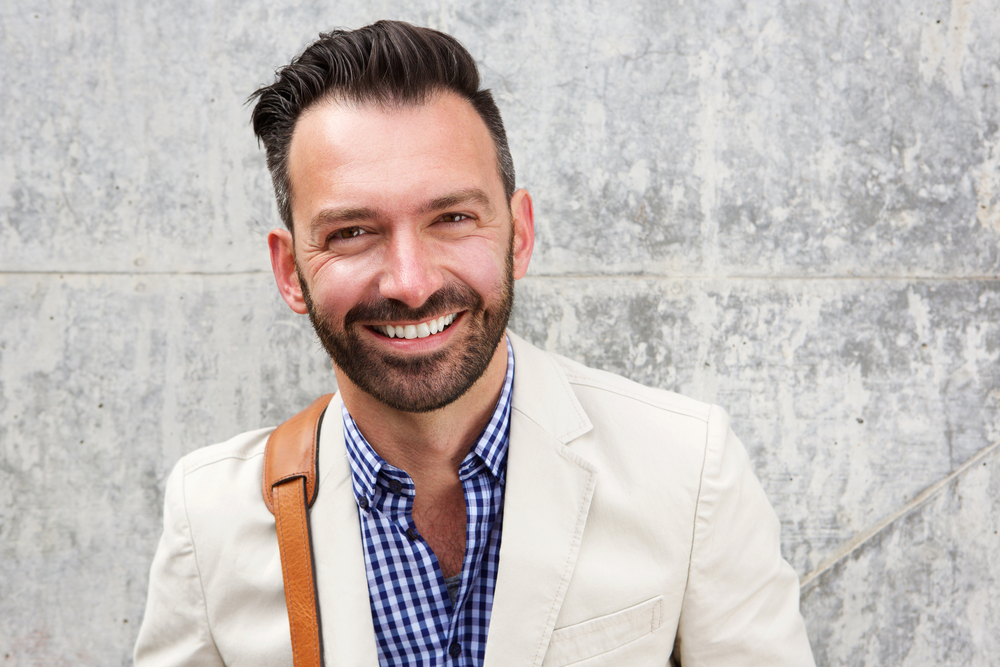 happy mature man with beard smiling