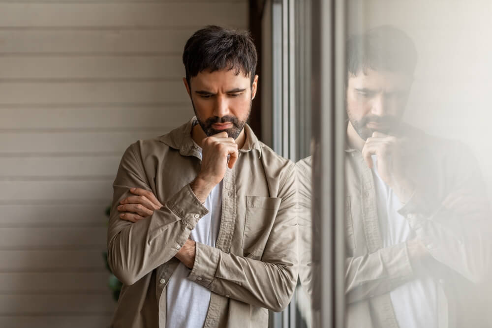 man contemplating his trauma