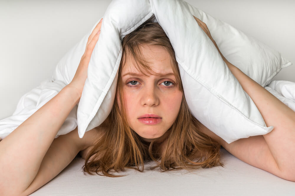 woman struggling with insomnia