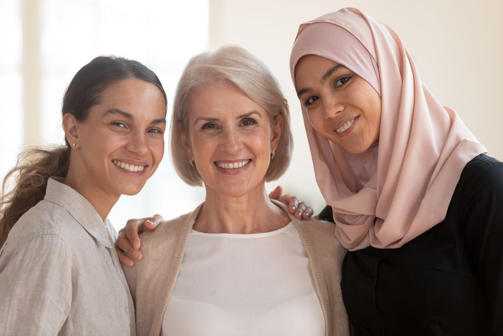 Three Happy Beautiful Diverse Two Generation Women Young Asian Muslim