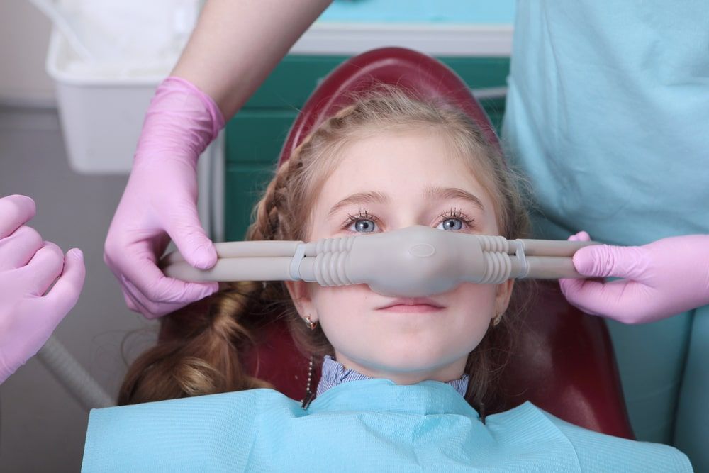 sedation. Treatment of children's teeth with nitrous oxide