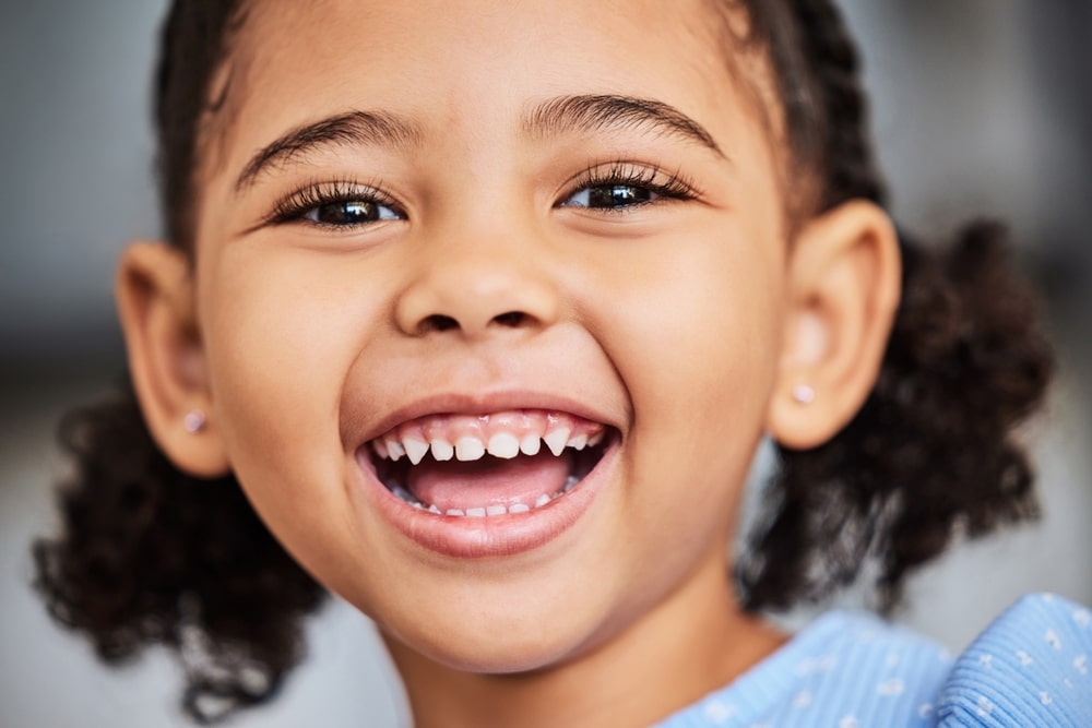 Excited and happiness of young kid with good oral hygiene