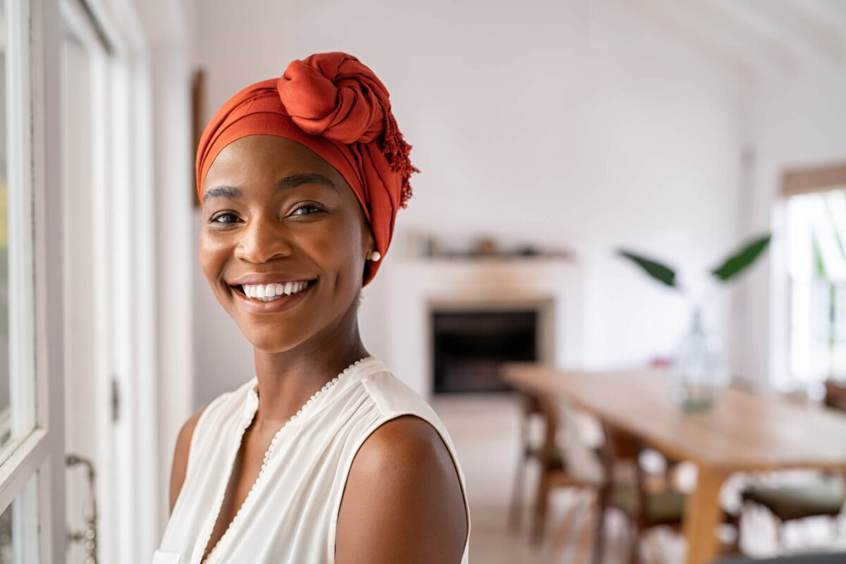 Portrait of a beautiful african woman smiling while looking at camera