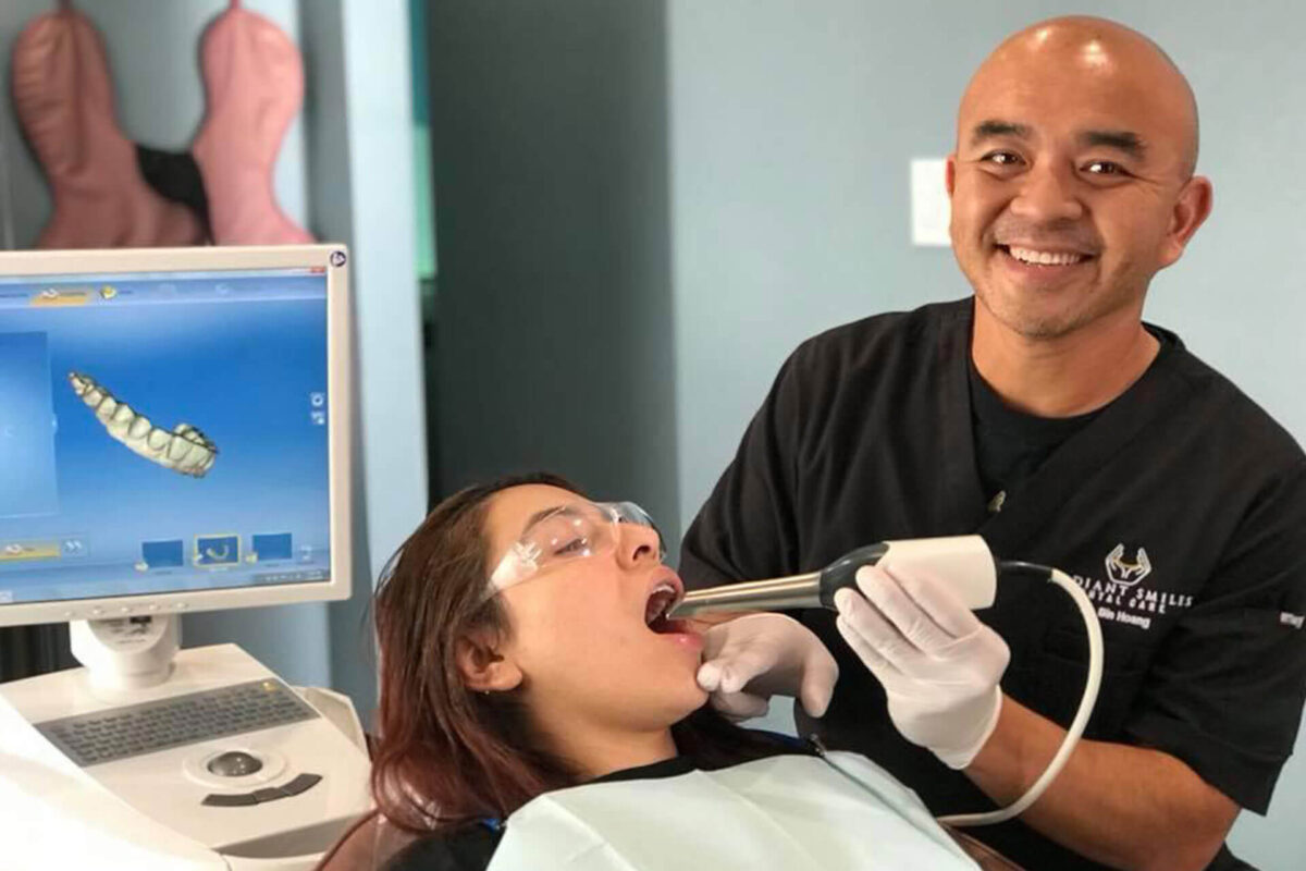 Dr. Bin Vinh Hoang with patient