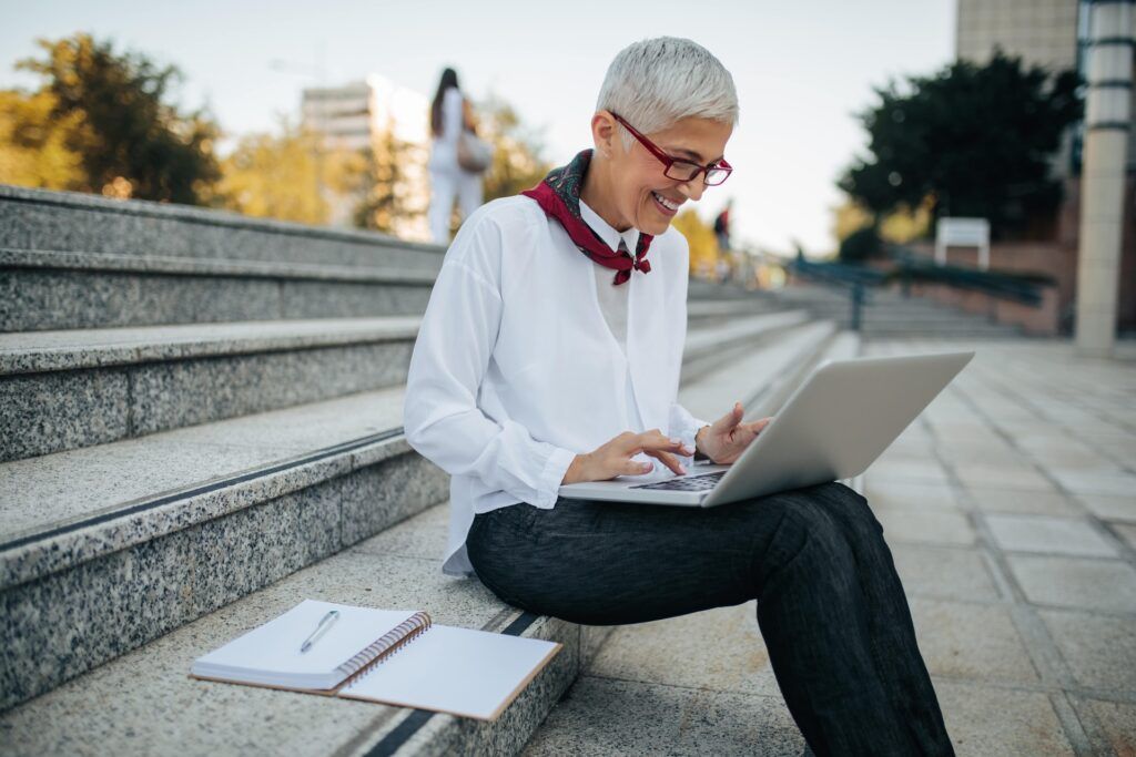 Middle age woman on laptop