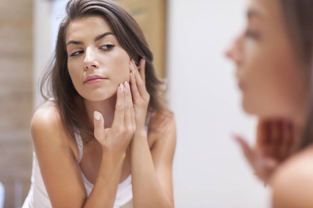 Woman taking care of her skin