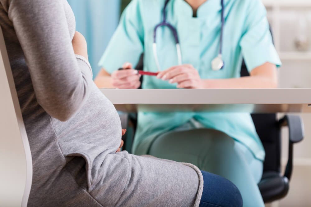 pregnant woman during medical visit