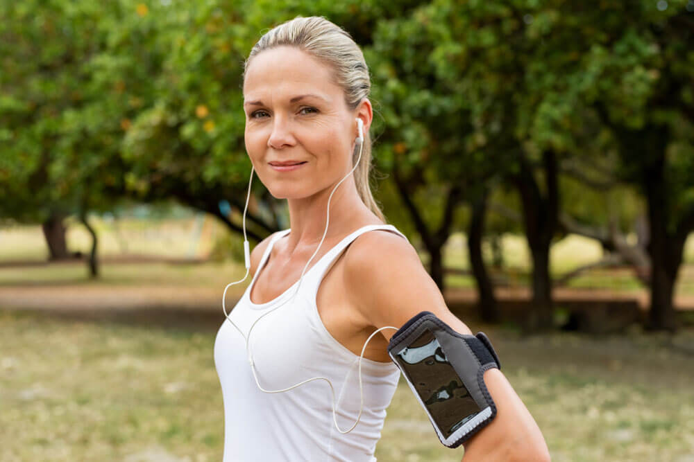 mature woman resting after jogging