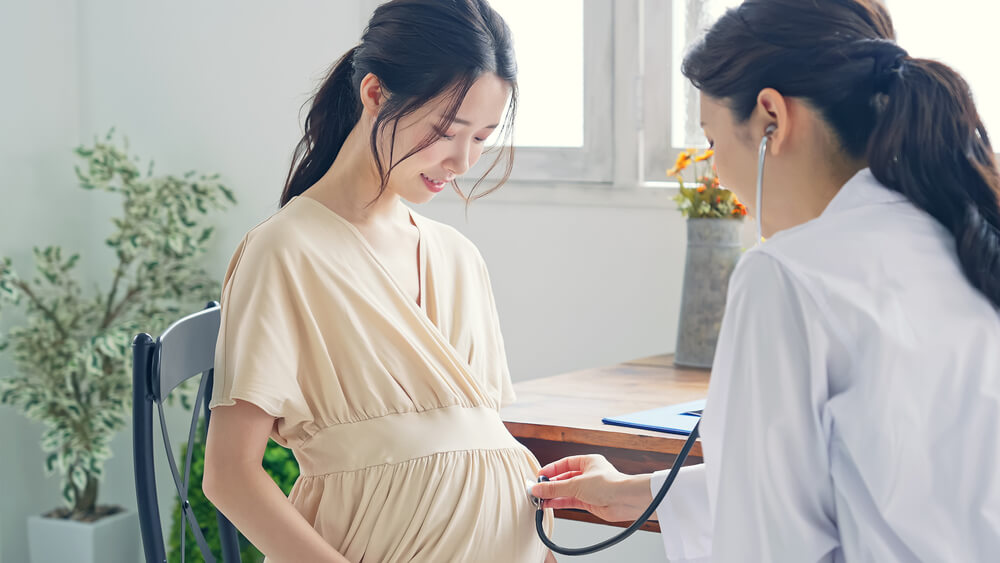 Pregnant woman taking consultation in the clinic.