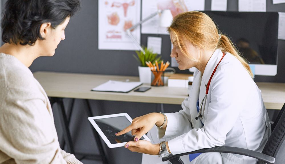 A doctor explaining Fibroids to a patient