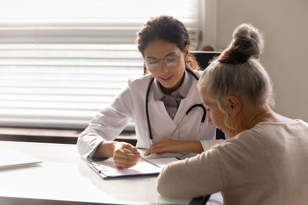 Doctor explaining a Colposcopy to a patient