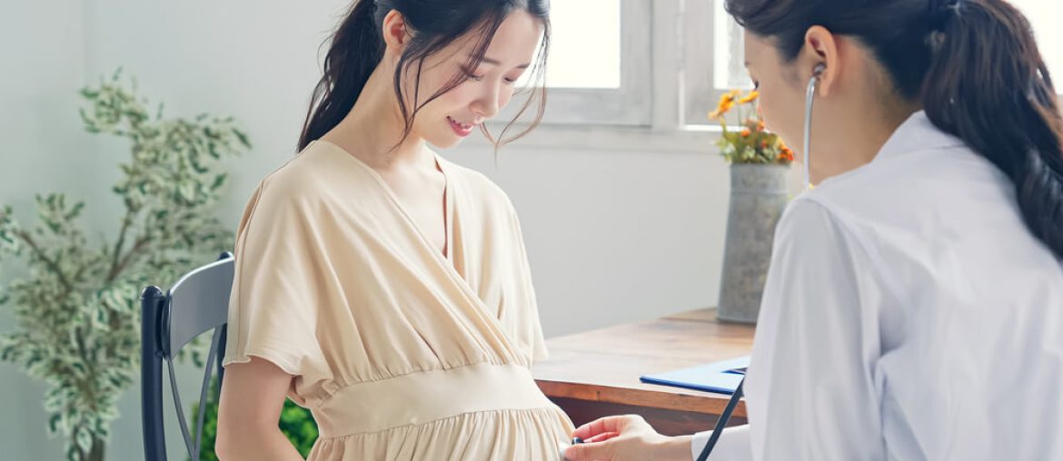 Pregnant woman taking consultation in the clinic.