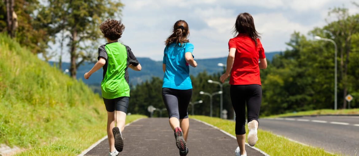 mother and kids running outdoor