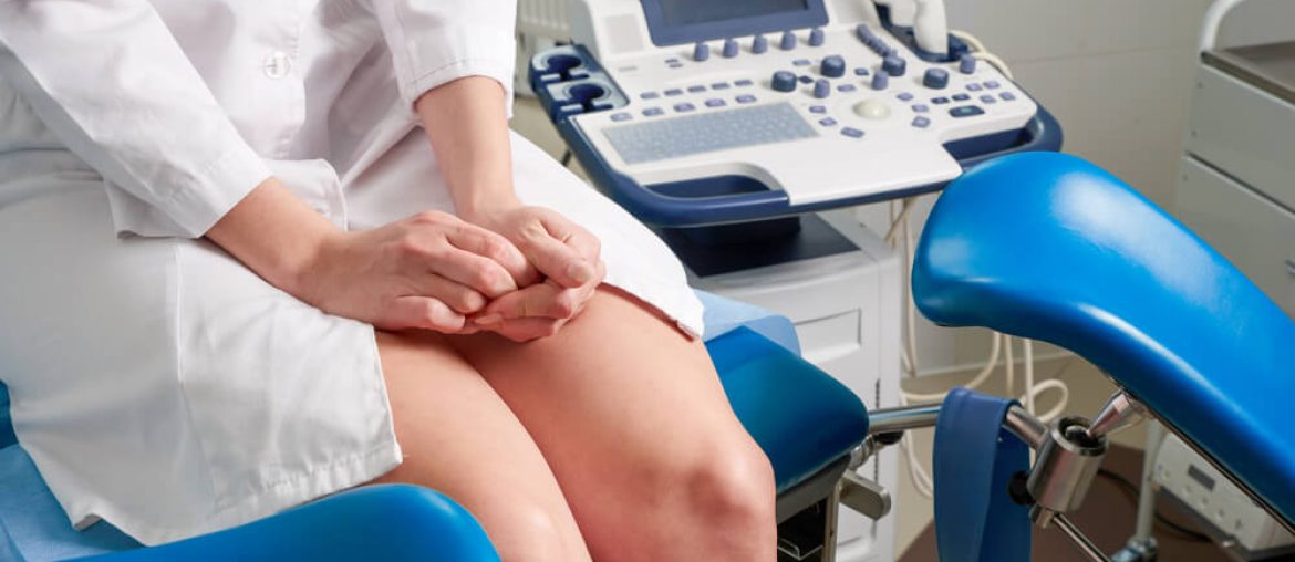 Woman at gynecologist office sitting and waiting for a doctor with test results