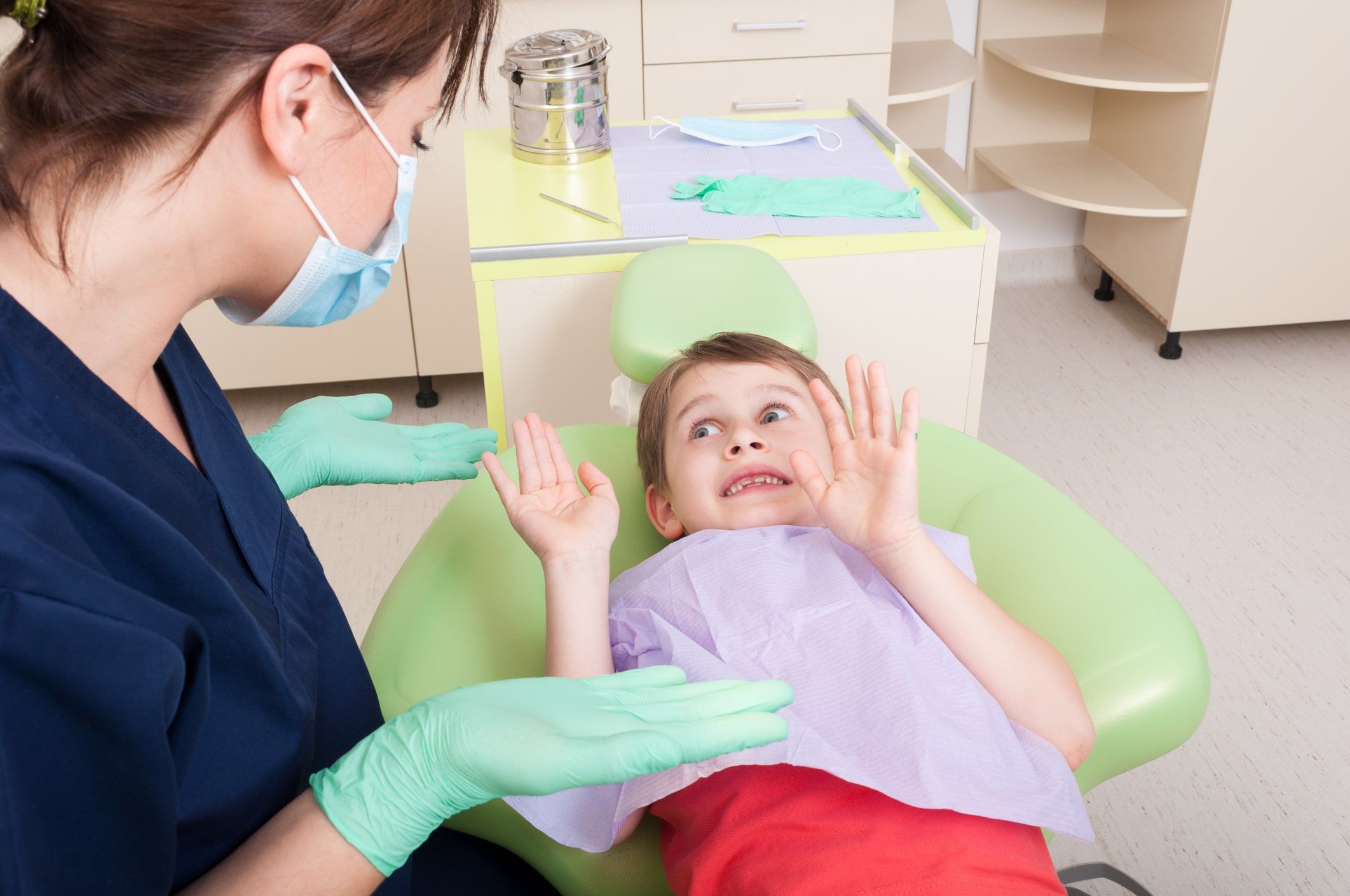 Nervous kid at dental clinic
