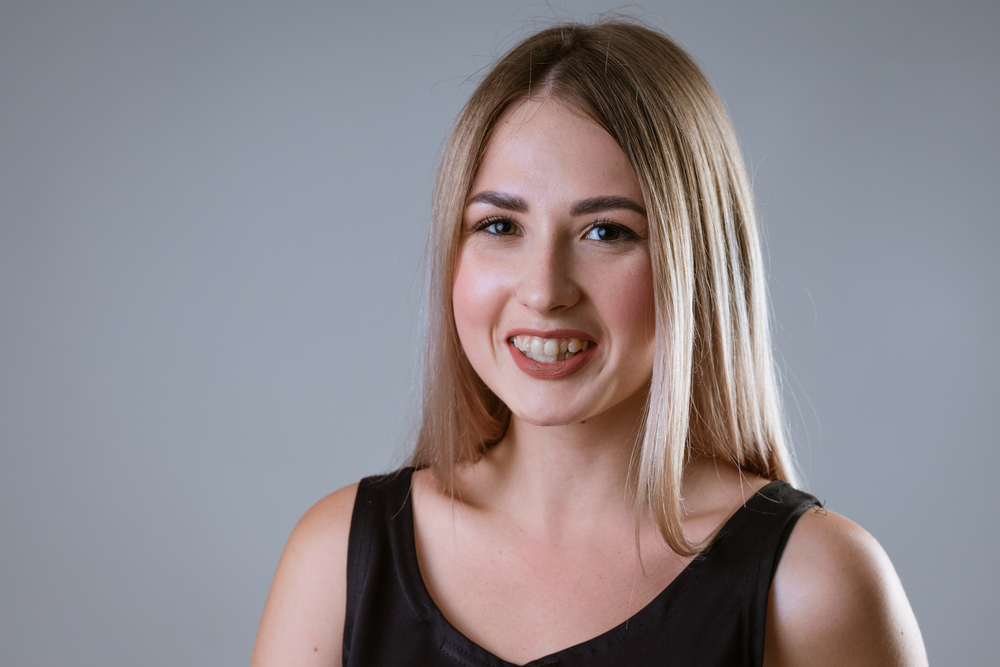 woman having crooked teeth