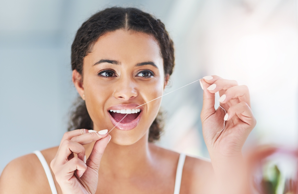 Woman,,Floss,And,Dental,Hygiene,In,Bathroom,For,Health,,Wellness
