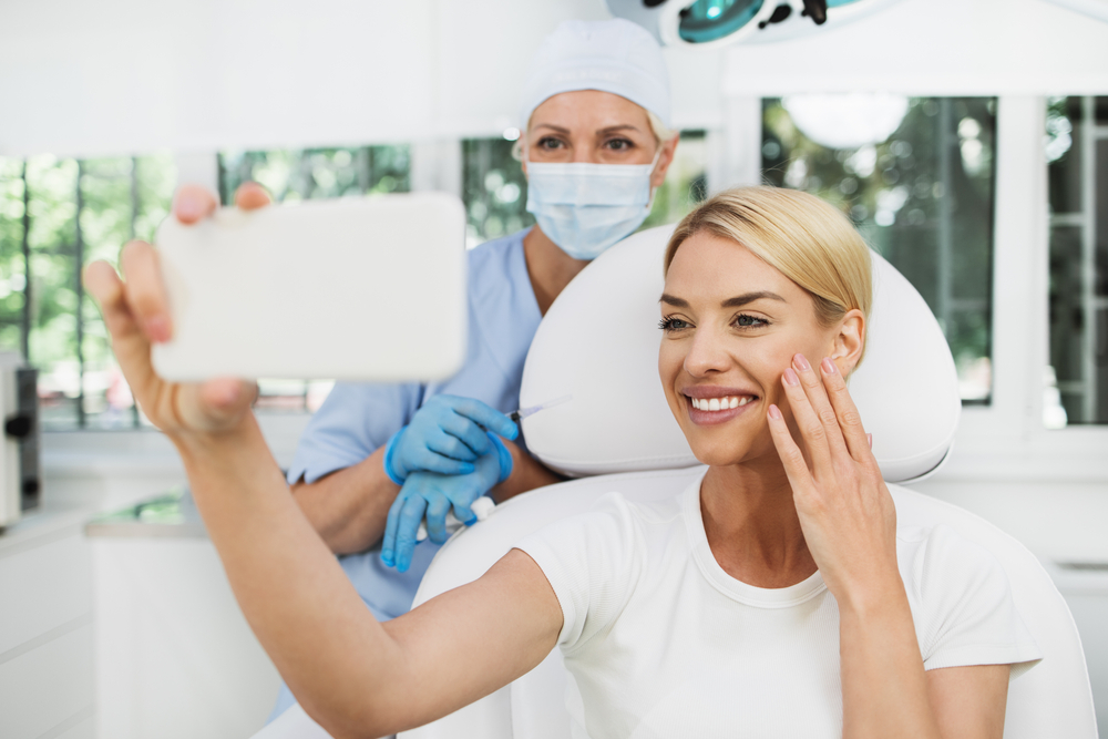 Beautiful and happy woman at beauty medical clinic