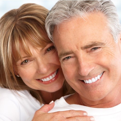 Happy Loving couple close up. Healthy white smile.